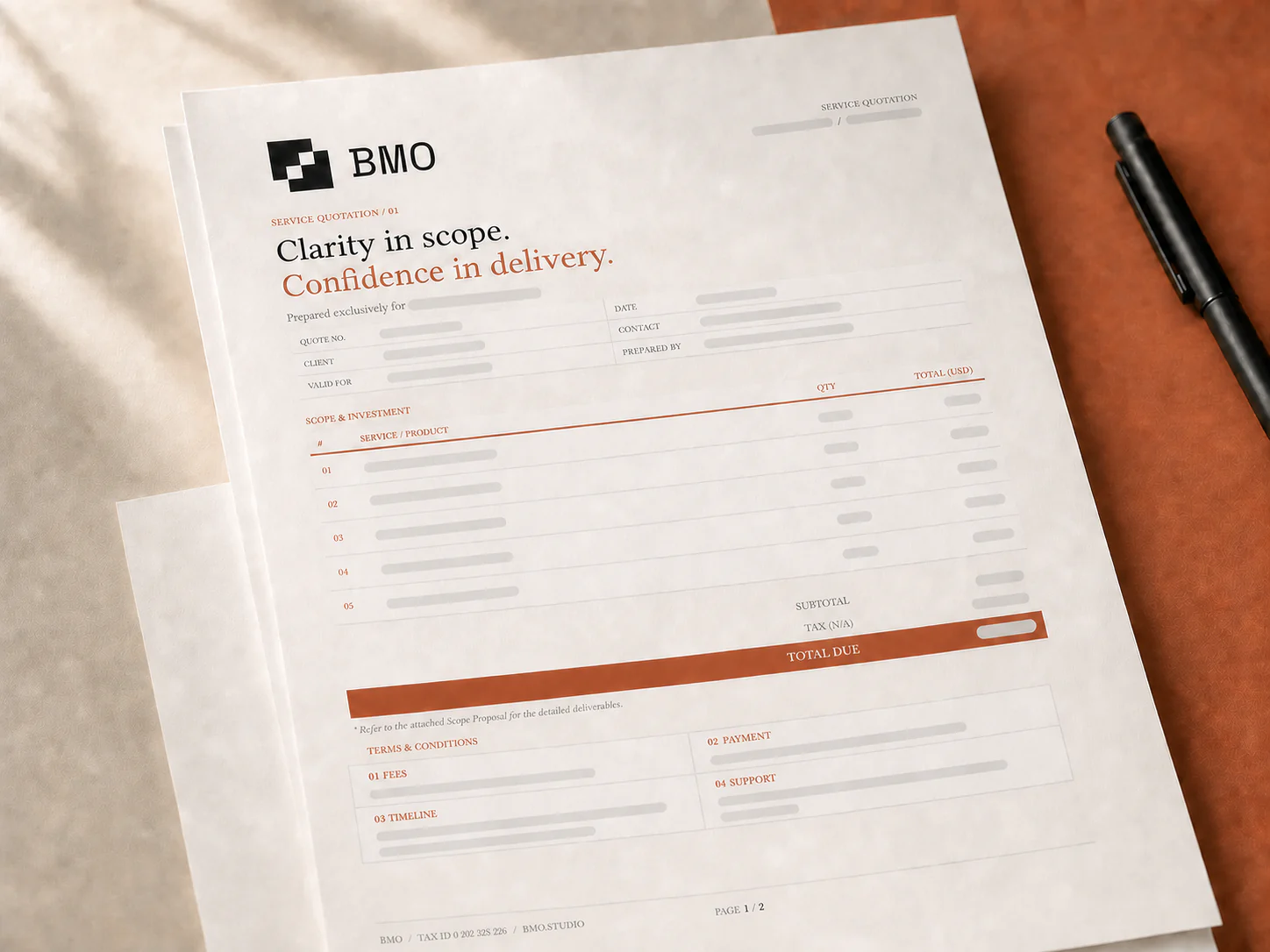 A printed BMO service quotation on a warm studio desk